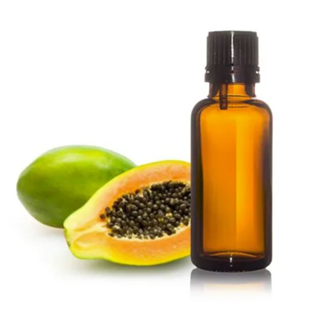 Papaya seed oil bottle with papaya fruit and seeds